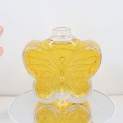 NC186 500ml 620g butterfly shape glass bottle